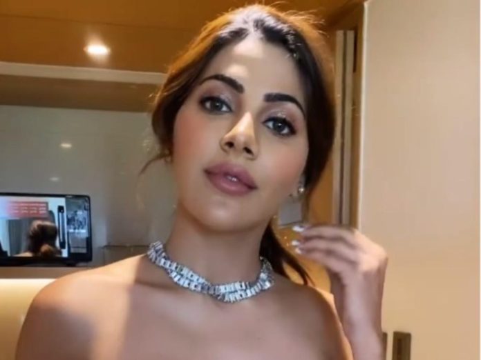 Nikki Tamboli's latest photoshoot raises the internet's mercury, bo*ld poses sitting on the ground