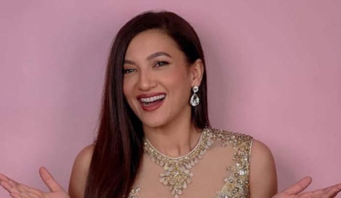 Gauahar Khan wore a very expensive Thigh high slit dress, knowing the price will blow her senses