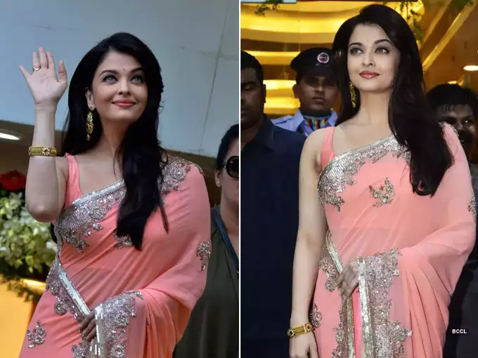 Aishwarya Rai Bachchan walked the ramp wearing a thin stripe blouse bo ld pictures created a stir informalnewz