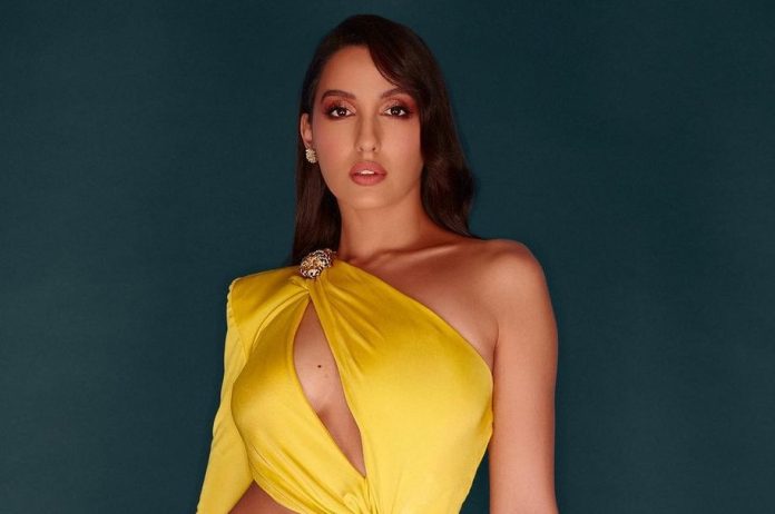 Nora Fatehi did a bold dance wearing a bralette and denim shorts on the beach, people said - Fire