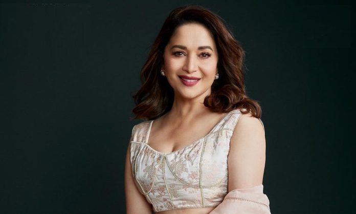 Madhuri Dixit wreaks havoc in white saree, eyes fixed on stylish blouse Madhuri Dixit wreaks havoc in white saree, eyes fixed on stylish blouse