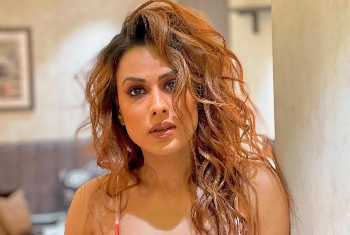 Nia Sharma white transparent shrug raised internet's mercury, bikini look captured on camera Nia Sharma white transparent shrug raised internet's mercury, bikini look captured on camera
