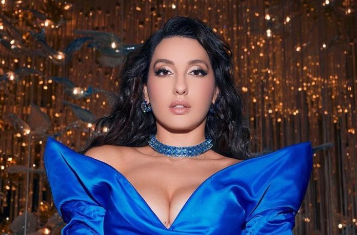 Nora Fatehi sizzles in a transparent blue plunging deep neckline dress, fans go crazy after seeing the pictures