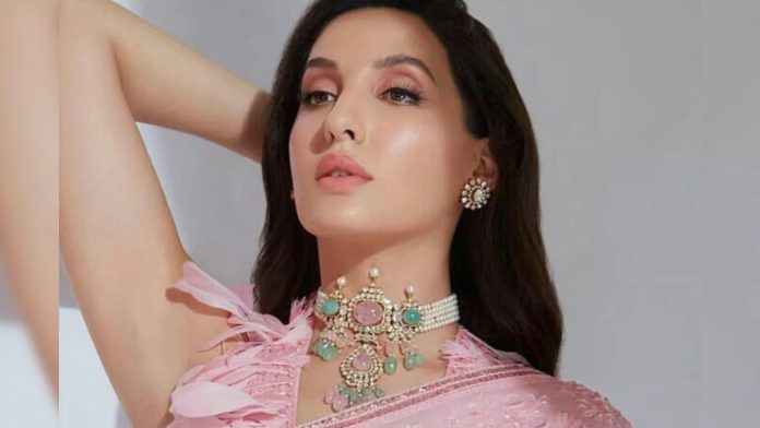 Nora Fatehi flaunts curvy figure in slit transparent gown, shares bold pictures