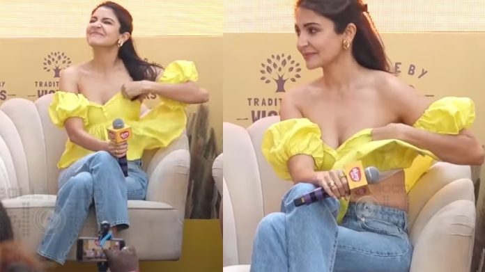 Anushka came out wearing a deep neck top, due to strong wind she became a victim of Oops Moment - Watch video
