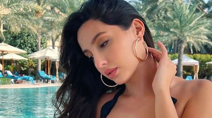 Nora Fatehi Video Seeing Nora Fatehi in such clothes at the airport, people trolled, said whether she is wearing a dress or...