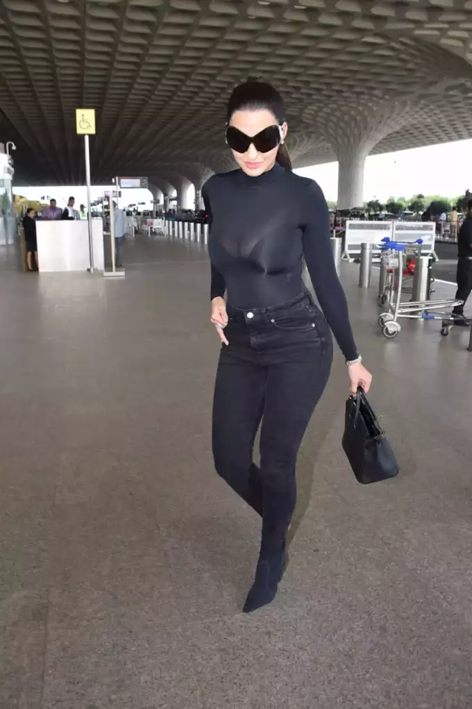 Nora Fatehi spotted in a transparent top at the airport, people were ...
