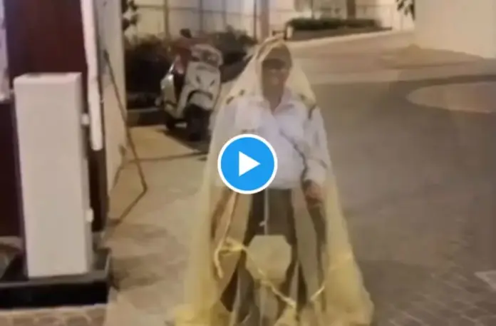 Security Guard Spotted on Duty Covered in a Mosquito Net; Video Melts Users' Hearts