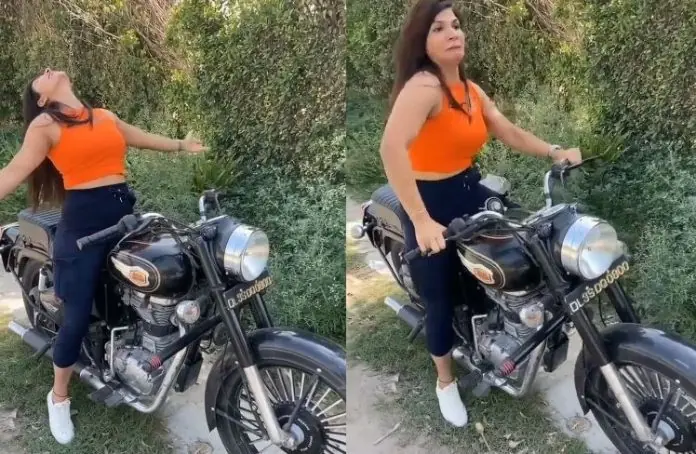 Video: Girl was dancing on 'thin kamariya' while sitting on the bullet, the oil came out as soon as her feet wobbled - Watch